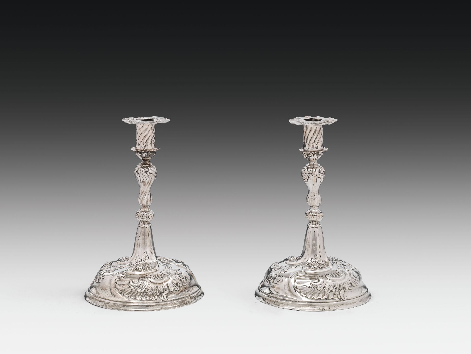 Pair of candlestickssilver; on the side marked: unclear hallmark, "G" and unclear maker's markh.