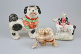 Konvolut von 3 Keramikfiguren, Japan, 19./20. Jh., bestehend aus: Hund, zwei Sumoringer und Reiter m
