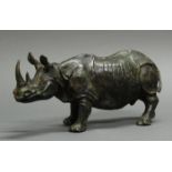 Bronze, "Nashorn", neuzeitlicher Guss, 15.5 cm hoch, 35 cm lang