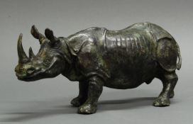 Bronze, "Nashorn", neuzeitlicher Guss, 15.5 cm hoch, 35 cm lang