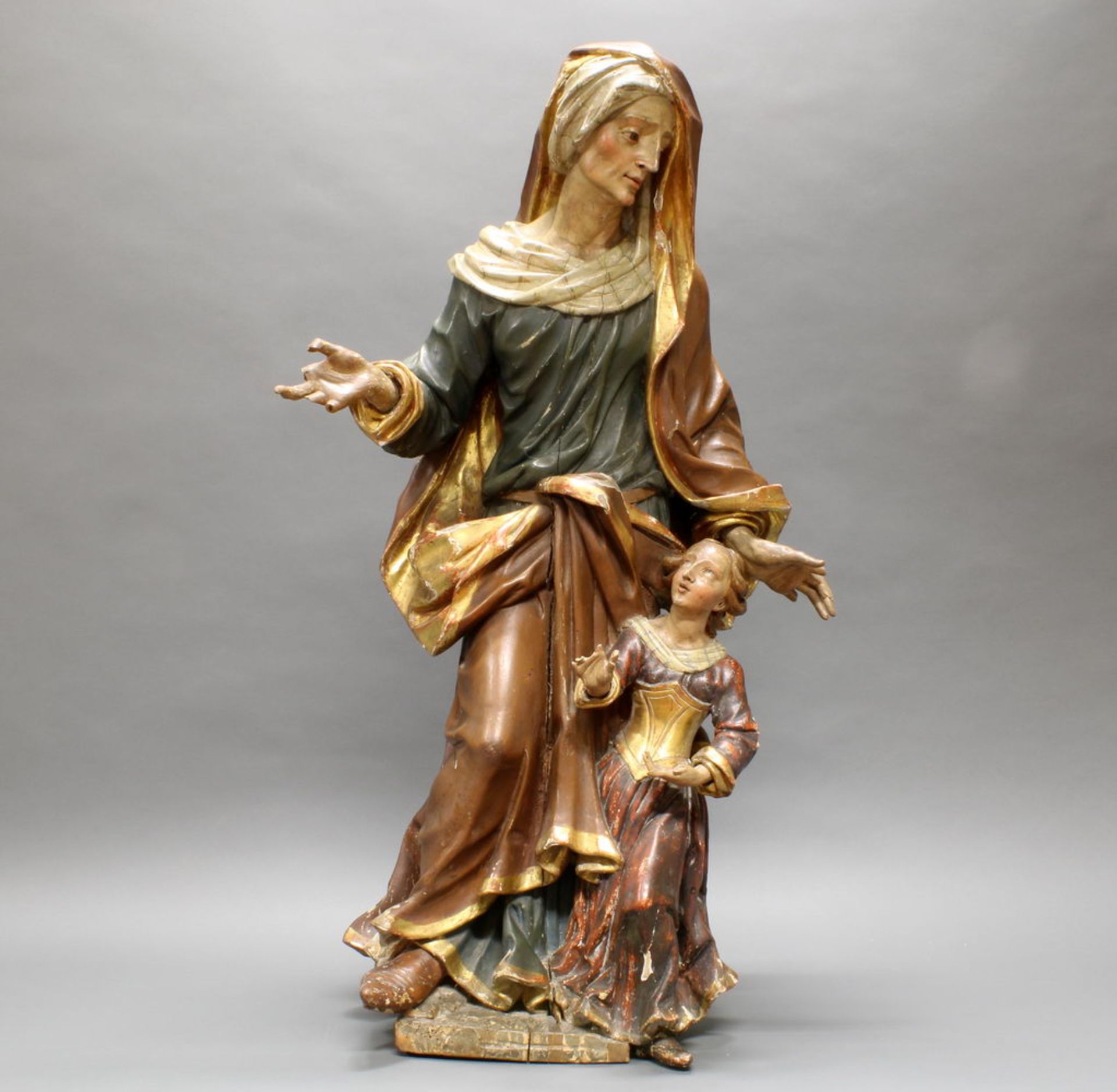 Skulptur, Holz geschnitzt, "Anna, Maria das Lesen lehrend", Italien, 18. Jh., 114 cm hoch, teils or