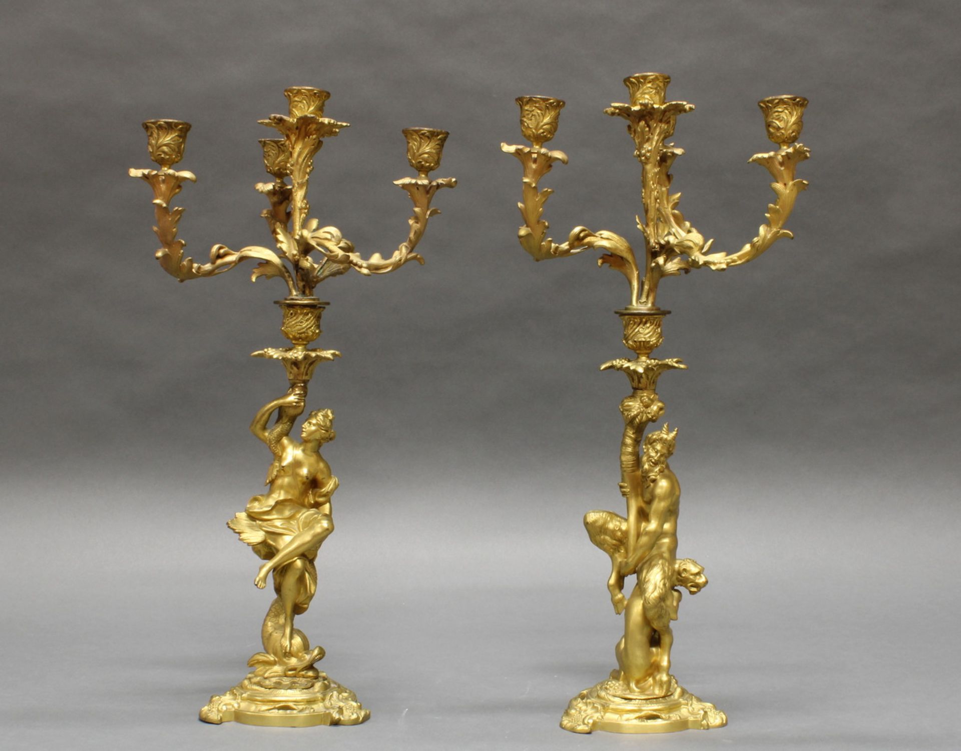 Paar Figurenleuchter, "Satyr", "Nereide", 19. Jh., Bronze, vergoldet, abnehmbare Krone dreiflammig,