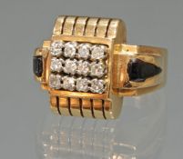 Ring, Art Deco, 1930er Jahre, RG 750, 12 Diamanten zus. ca. 0.60 ct., etwa w/si, 8/8-Schliff, Onyx,