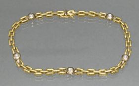 Armband, GG 750, 5 Brillanten zus. ca. 0.50 ct., 20.5 cm lang, 14 g