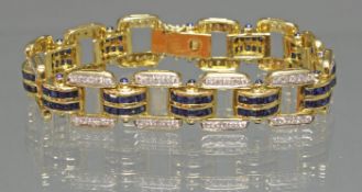 Armband, GG 750, 120 Diamanten zus. ca. 1.8 ct., 120 quadratisch facettierte Saphire, 18 cm lang, 3