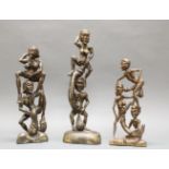 3 Skulpturen, "Erotische Figuren", Südostasien, 20. Jh., Holz, geschnitzt, 42.5-57 cm hoch