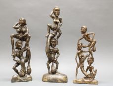 3 Skulpturen, "Erotische Figuren", Südostasien, 20. Jh., Holz, geschnitzt, 42.5-57 cm hoch