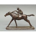 Bronze, dunkelbraun patiniert, "Jockey", 20. Jh., 20 cm hoch, 28 cm lang, an einigen Stellen Patina