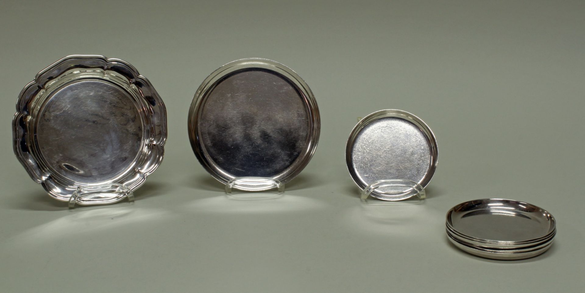 6 Untersetzer, Flaschenteller, Silber 925, Bruckmann, glatt, ø 8.7 cm, ø 12.8 cm, zus. ca. 622 g,