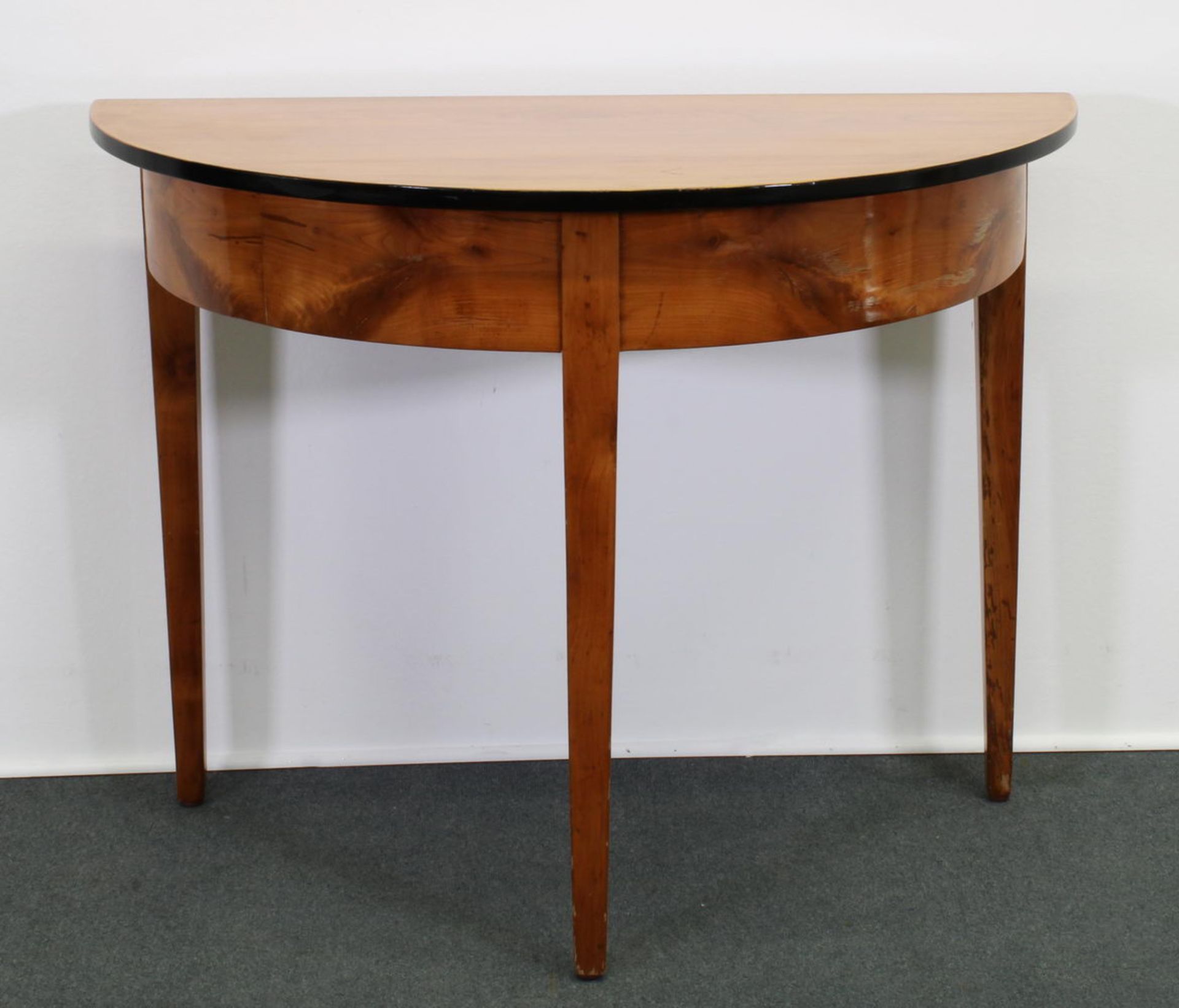 Konsoltisch, Biedermeier, 19. Jh., Demi-lune, ebonisierte Kante, Vierkantbeine, 76.5 x 100 x 50 cm,