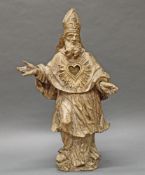 Reliquienskulptur, Holz geschnitzt, "Bischof", Reliquie undeutlich bezeichnet San Leon...(?), Reste