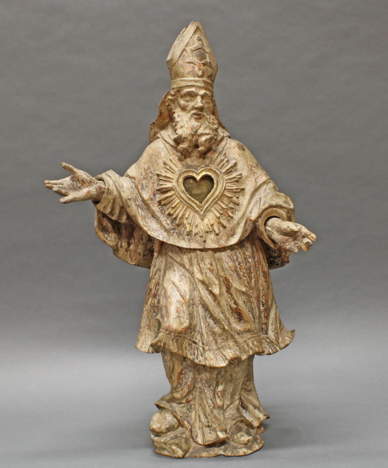 Reliquienskulptur, Holz geschnitzt, "Bischof", Reliquie undeutlich bezeichnet San Leon...(?), Reste