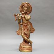 Figur, "Flötespielender Krishna", Indien, 20. Jh., Messingbronze, Reste von roter Farbe, 61.5 cm h