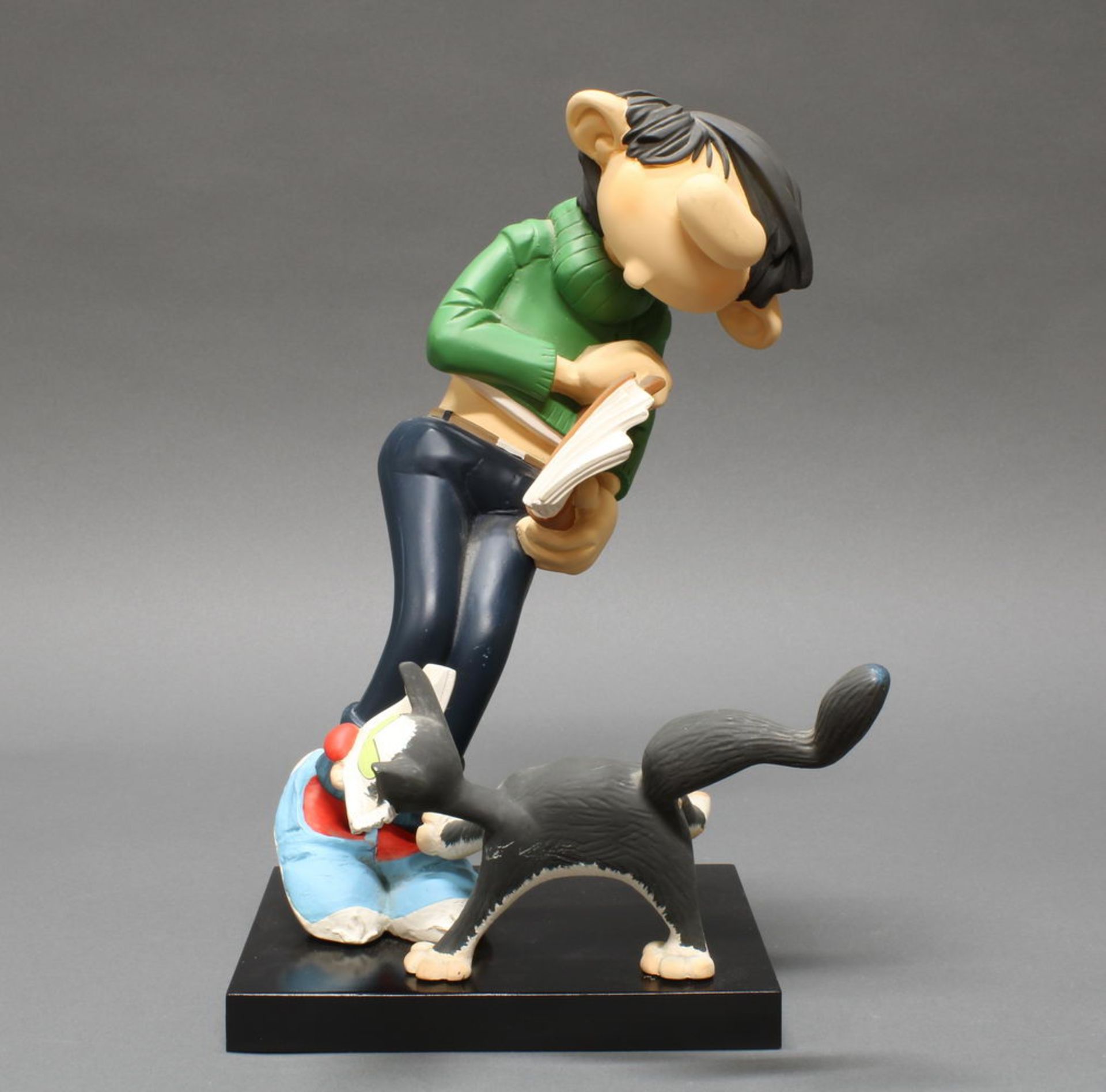 Comicfigur, "Gaston Lagaffe mit Katze", Frankreich, 20. Jh., Kunstharz, polychrom, Leblon Delienne,