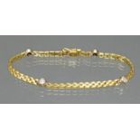 Armband, WG/GG 750, 4 Brillanten zus. ca. 0.40 ct., 19 cm lang, 13 g