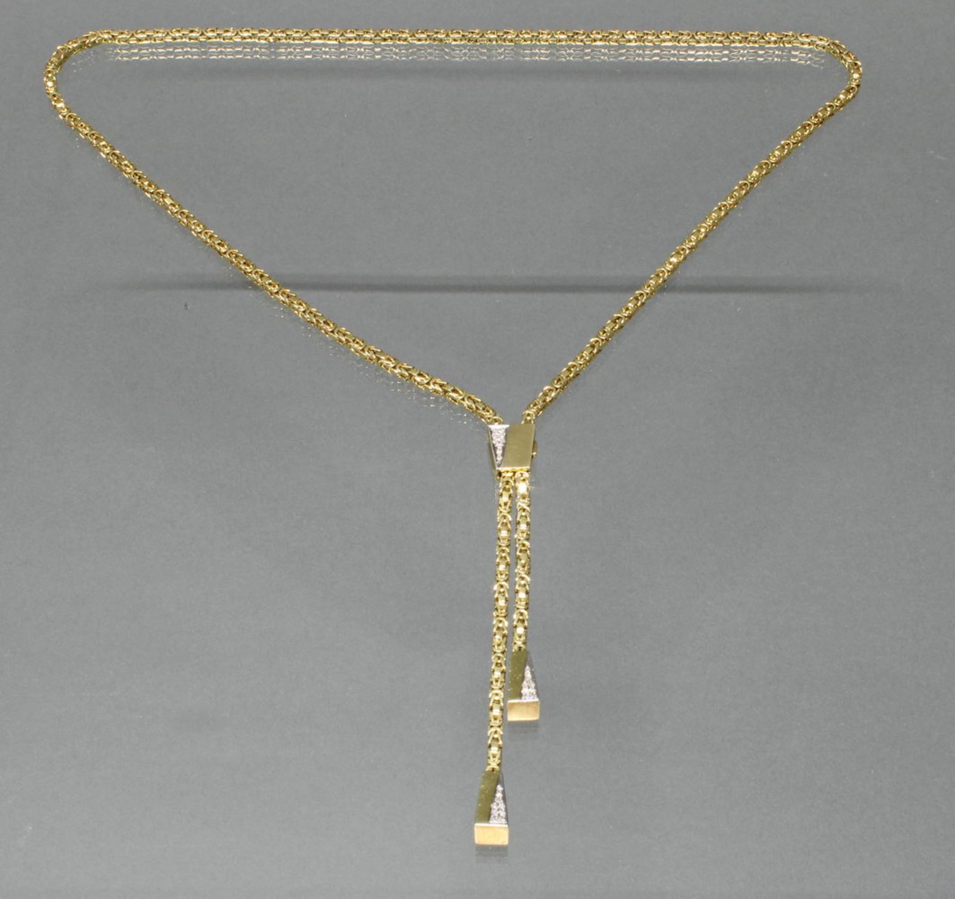 Y-Collier/Königskette, mit Verstellclip, WG/GG 585, 27 Diamanten zus. ca. 0.25 ct., alle etwa fw/s