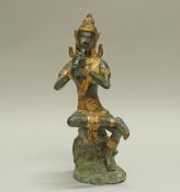 Figur, "Flötenspielerin", Thailand, neuzeitlich, Bronze, grünlich und golden patiniert, 36 cm hoc