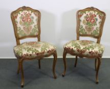 Paar Stühle, Louis XV-Stil, 19. Jh., Bezug mit floralem Motiv, H. 90 cm, leichte Gebrauchsspuren
