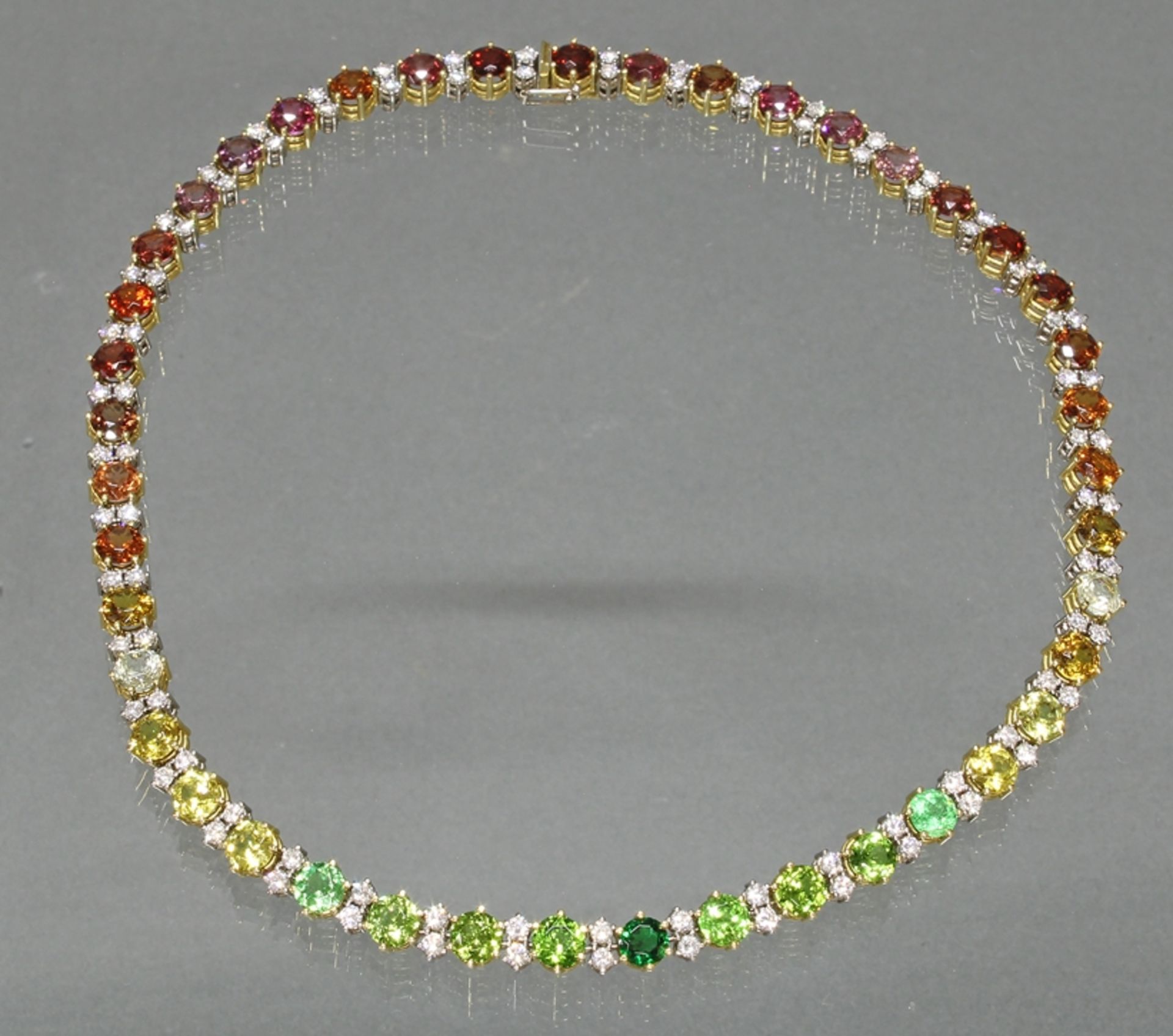 Collier, GG 750, 86 Brillanten zus. ca. 4.30 ct., 43 verschiedenfarbene Edelsteine u.a. Citrin, ver