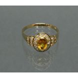 Ring, GG 585, oval facettierter Citrin, 22 Brillanten zus. ca. 0.44 ct., 2 g, RM 18.5