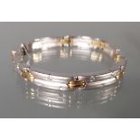 Armband, modernes Design, WG/GG 750, 24 Brillanten zus. ca. 0.48 ct., 18.5 cm lang, 35 g