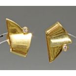 Paar Ohrstecker, GG 750, 2 Brillanten zus. ca. 0.10 ct., 10 g