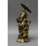 Figur, "Ganesha mit Schirm und Kanne", Indien, 20. Jh., Metall, patiniert, 38 cm hoch