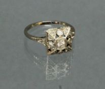 Ring, Art Deco, um 1930, WG 585, 1 Diamant ca. 0.06 ct., Altschliff, 13 Besatz-Diamanten (einer feh