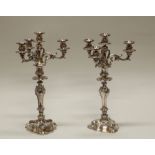Paar Kerzenleuchter, Silber 13-lötig, vierflammig, ca. 42 cm hoch, zus. 1.090 g (ohne geschwerten S