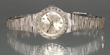 Schmuck-Damenarmbanduhr, Omega, 1980er Jahre, WG 750, Diamant-Lünette, Handaufzug, silberfarbenes Z