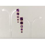 Paar Ohrgehänge, RG 750, 10 verschieden große Amethyste zus. ca. 7.70 ct., Carréeschliff, 4 cm lang