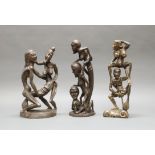 3 Skulpturen, "Erotische Figuren", Bali, 20. Jh., Holz, geschnitzt, 43-48 cm hoch