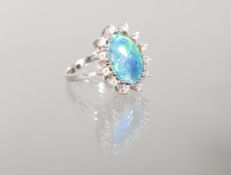 Ring, WG 585, Opal-Doublette, 12 Brillanten zus. ca. 0.24 ct., 6 g, RM 18
