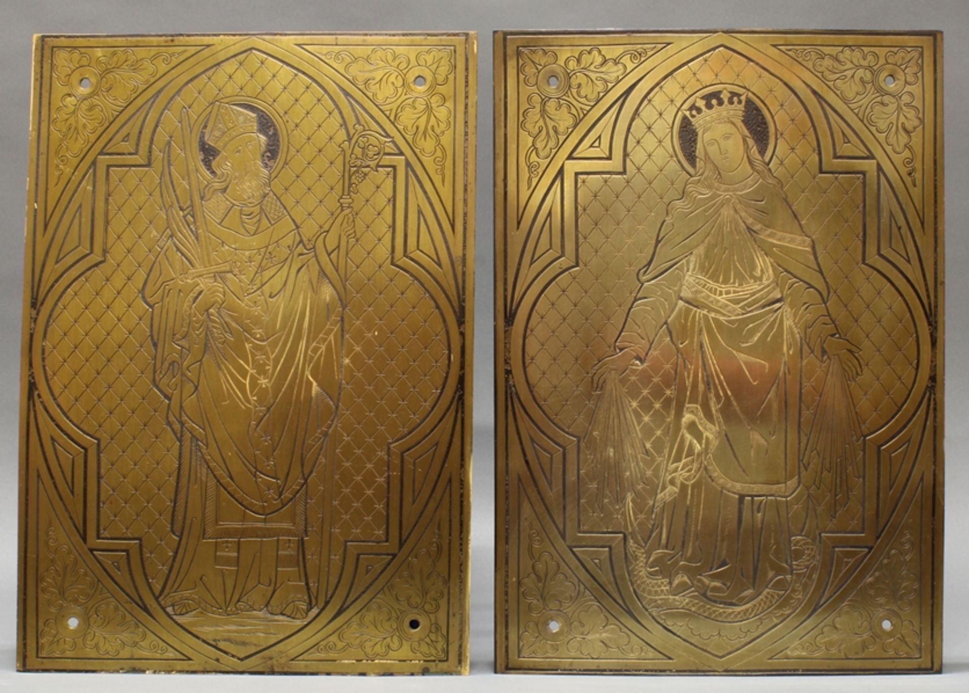 2 Reliefplatten, Metall, "Heiligendarstellungen", um 1900, jeweils 53 x 37 cm, kleine Beschädigunge