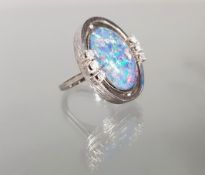 Ring, WG 585, mattiert, große Opal-Triplette, 6 Brillanten zus. gepunzt 0.36 ct., etwa w/si, 11 g, 
