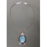 Collier, WG 585, mattiert, große Opal-Triplette, 6 Brillanten zus. gepunzt 0.36 ct., etwa w/si, ca.