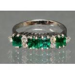 Ring, WG 750, 4 rechteckig facettierte Smaragde, 6 Besatzbrillanten, 3 g, RM 16