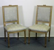 Paar Stühle, Louis XVI-Stil, 19./20. Jh., gold gefasst, hellblauer Bezug, H. 93 cm
