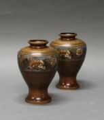 Paar Vasen, Japan, um 1900, Bronze, bauchige Gefäße zum Stand hin eingezogen, auf der Schulter farb
