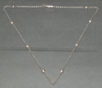 Collierkettchen, WG 750, 8 kleine Diamanten, ca. 40 cm lang, 5 g