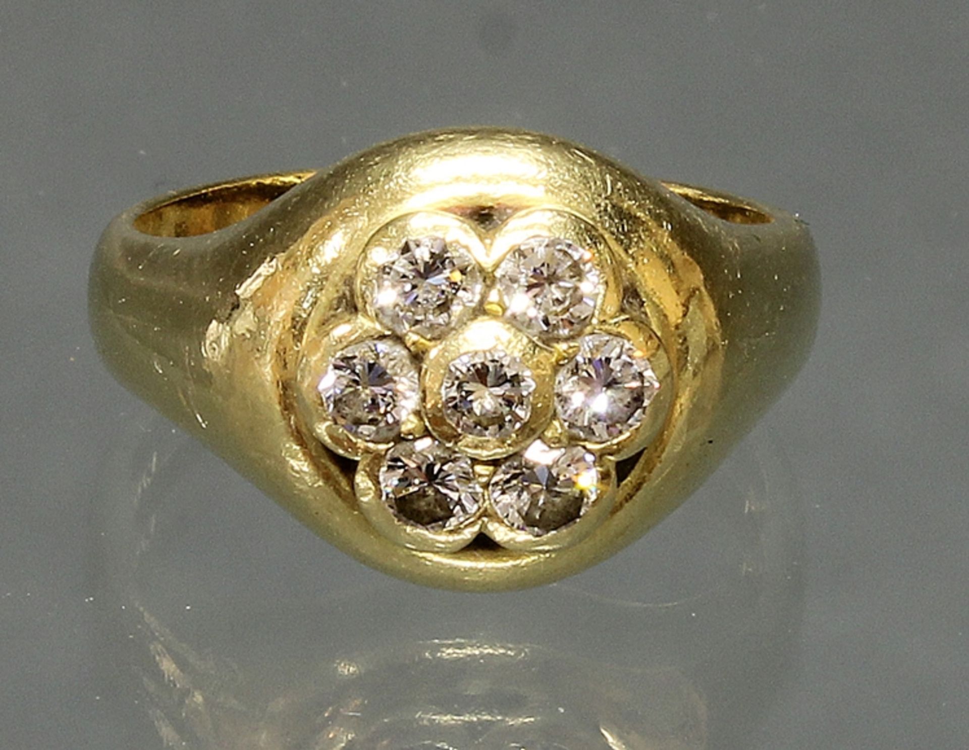 Ring, GG 750, 7 Brillanten zus. ca. 0.70 ct., 9 g, RM 17.5