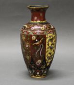 Vase, Japan, um 1900, Cloisonné, umlaufende Reserven in Lanzettblattform mit Tieren und Blüten, ave