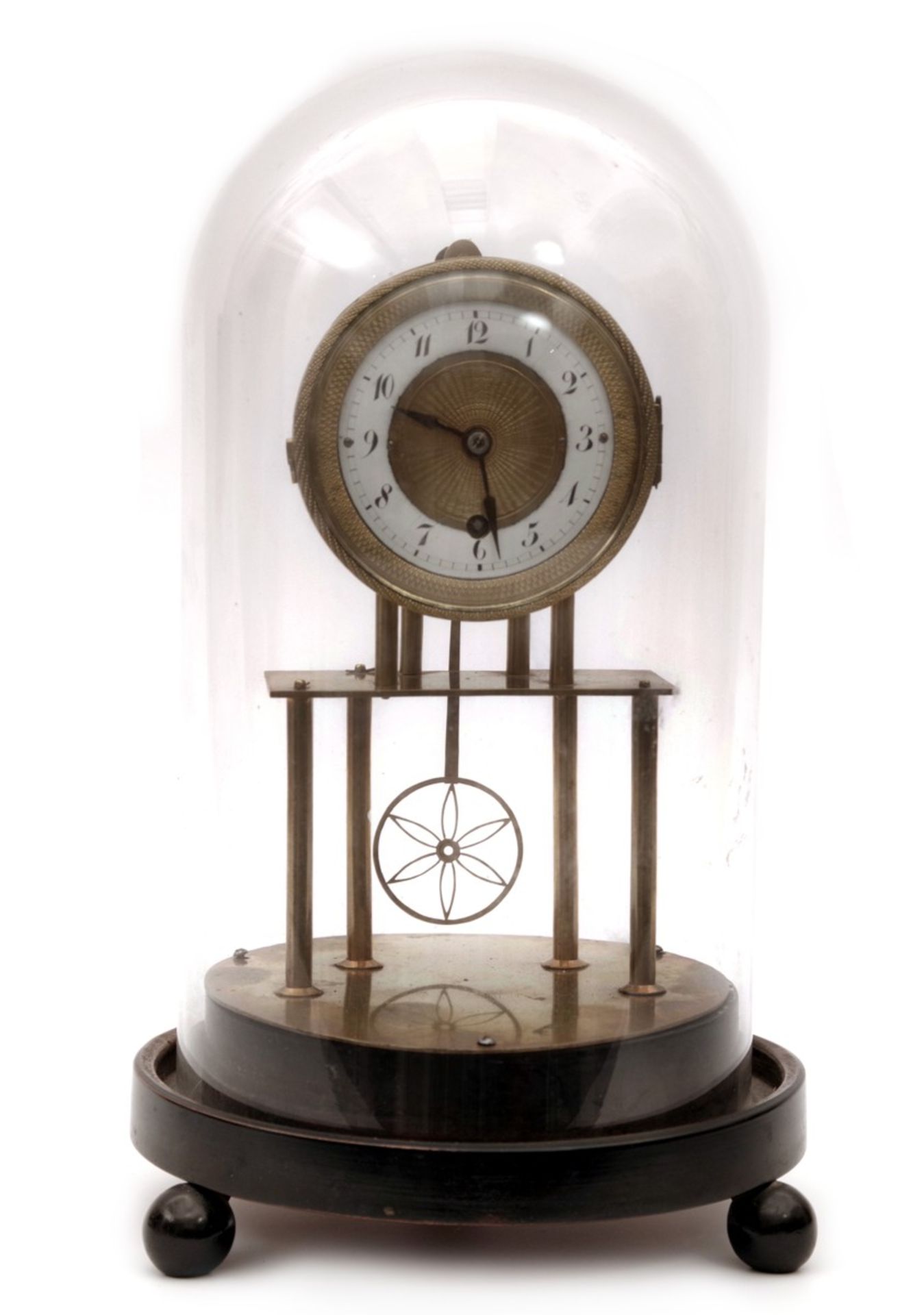 A Small Table Clock with Glass Dome