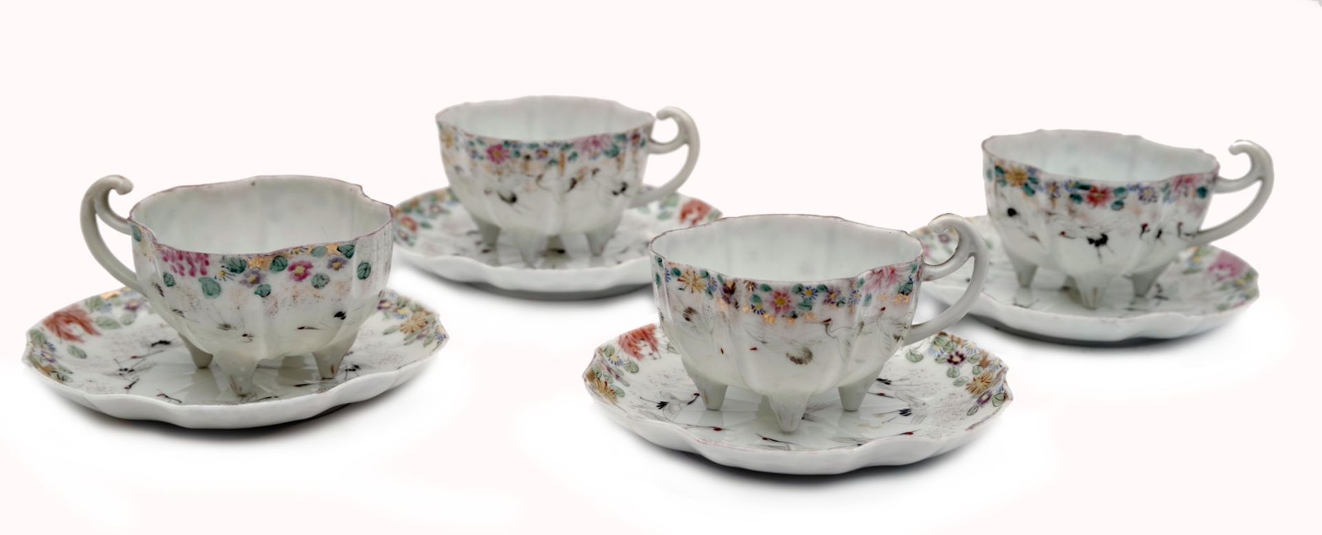 A Set of four Cups and Saucers