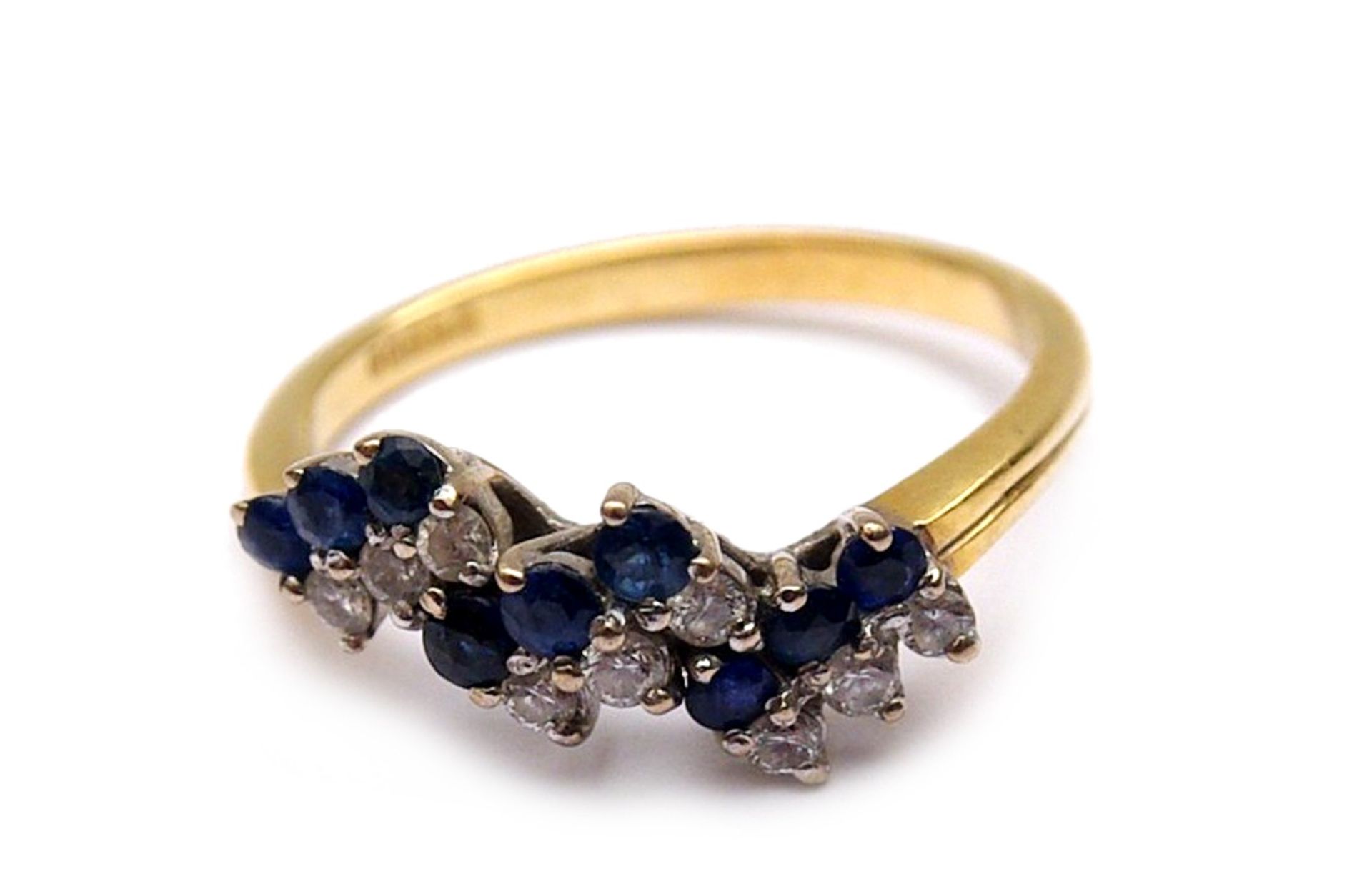 Ladies ring with diamonds and sapphires