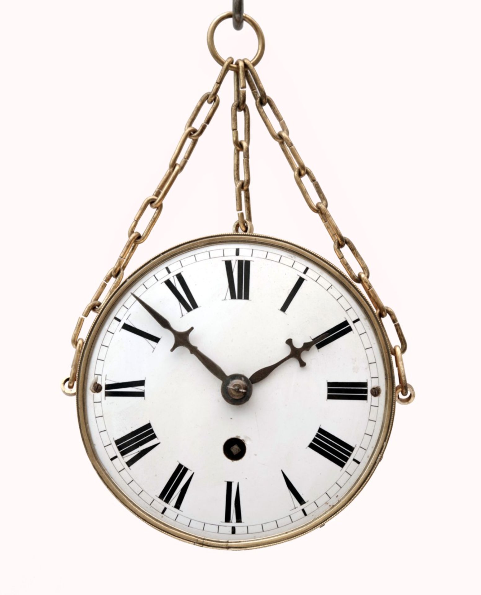 A Hanging Wall Clock With Chain