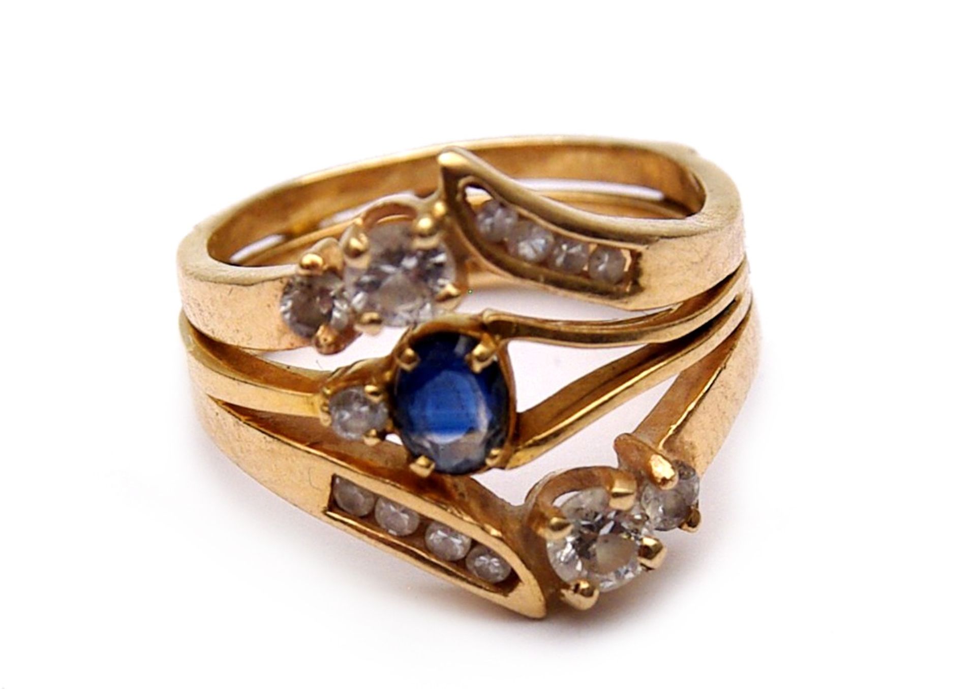 A blue sapphire and diamond ring