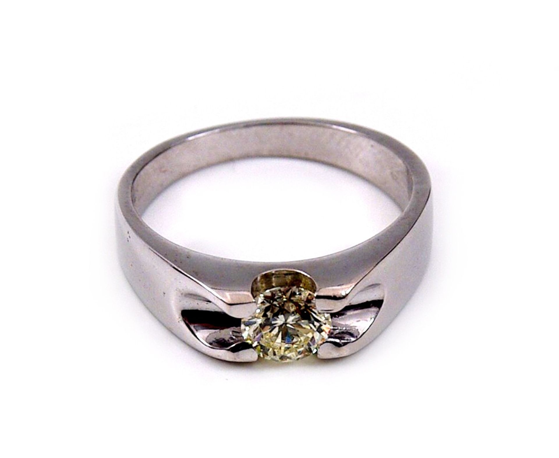 A diamond solitaire ring