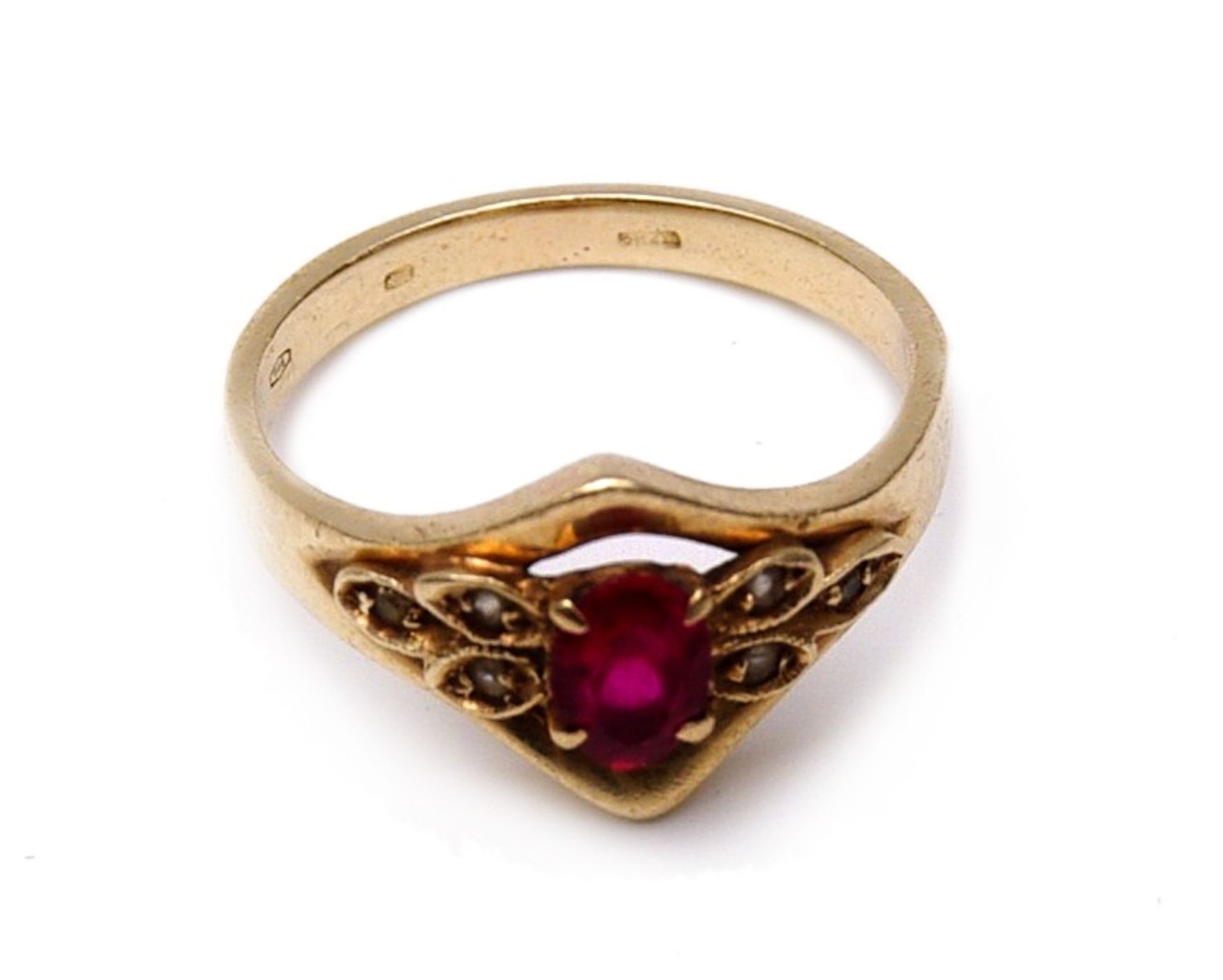 A ring with a red stone