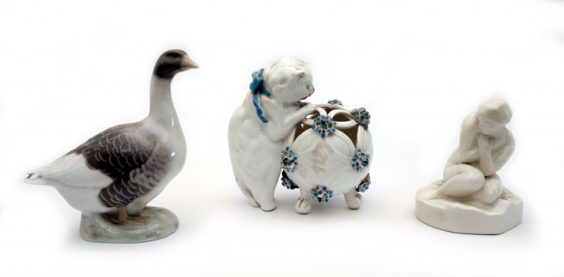 A Group of Three Porcelain Figures